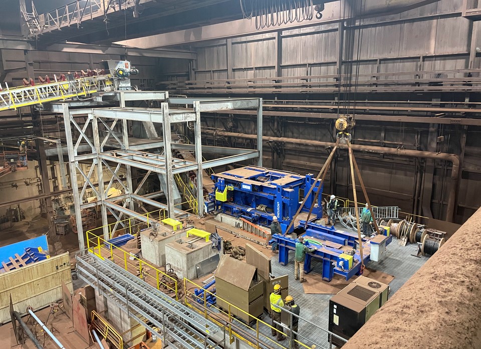 Group of workers installing High Pressure Grinding Roll (HPGR) at the Tilden Mine