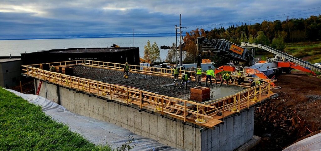 Workers laying concrete at the Two Harbors Water Treatment plant